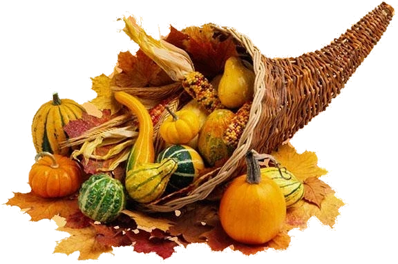 A wicker cornucopia overflowing with pumpkins, gourds, Indian corn and autumn leaves
